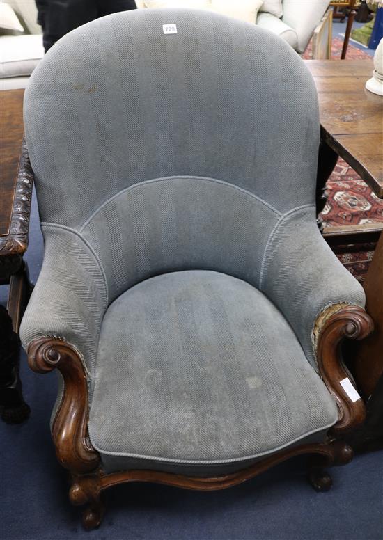 A Victorian rosewood spoonback armchair